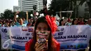 Parade Hari Pelanggan Nasional (Harpelnas) 2016 di Kawasan Bundaran Hotel Indonesia, Jakarta, Minggu (4/9). Kegiatan tersebut sebagai bentuk kepedulian bersama kepada pelanggan. (Liputan6.com/Johan Tallo)