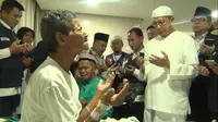 Menag Lukman Hakim Saifuddin saat berdoa bersama jemaah haji Indonesia di Klinik Sektor 8 Mekkah, Arab Saudi, Kamis (17/9/2015). (Liputan6.com/Wawan IR)  (