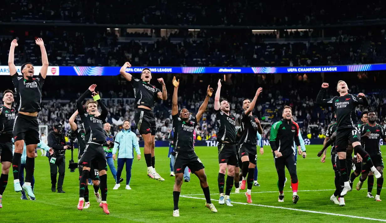 Kemenangan ini membuat Arsenal unggul atas Real Madrid dengan agregat 5-1 setelah di leg pertama menang 3-0. (AP Photo/Manu Fernandez)