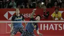 Ganda putra Indonesia, Kevin Sanjaya / Marcus Gideon, mengembalikan kok saat melawan ganda Jerman pada Indonesia Masters 2019 di Istora Senayan, Jakarta, Rabu (23/1). Kevin / Marcus lolos ke 16 besar. (Bola.com/M. Iqbal Ichsan)