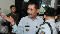 Mantan Kepala LP Nusakambangan, Liberty Sitinjak usai memenuhi panggilan BNN, Jakarta, Senin (8/8). BNN memanggil Liberty Sitinjak untuk mengusut testimoni Freddy Budiman yang diungkap Koordinator Kontras Haris Azhar. (Liputan6.com/Yoppy Renato)