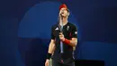 Ekspresi kecewa petenis Inggris, Andy Murray setelah gagal mencetak poin saat melawan pasangan Amerika pada babak perempat final tenis nomor ganda campuran Olimpiade Paris 2024 di Roland-Garros Stadium, Paris, Prancis, Kamis (01/08/2024). (AFP/Carl De Souza)