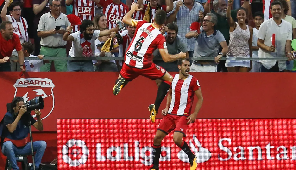 7. Cristhian Stuani (Girona) - 7 Gol. (AFP/Pau Barrena)