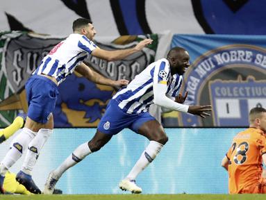 Pemain Porto, Moussa Marega, merayakan gol yang dicetak ke gawang Juventus pada laga Liga Champions di Stadion Dragao, Kamis (18/2/2021). Porto menang dengan skor 2-1. (AP/Luis Vieira)