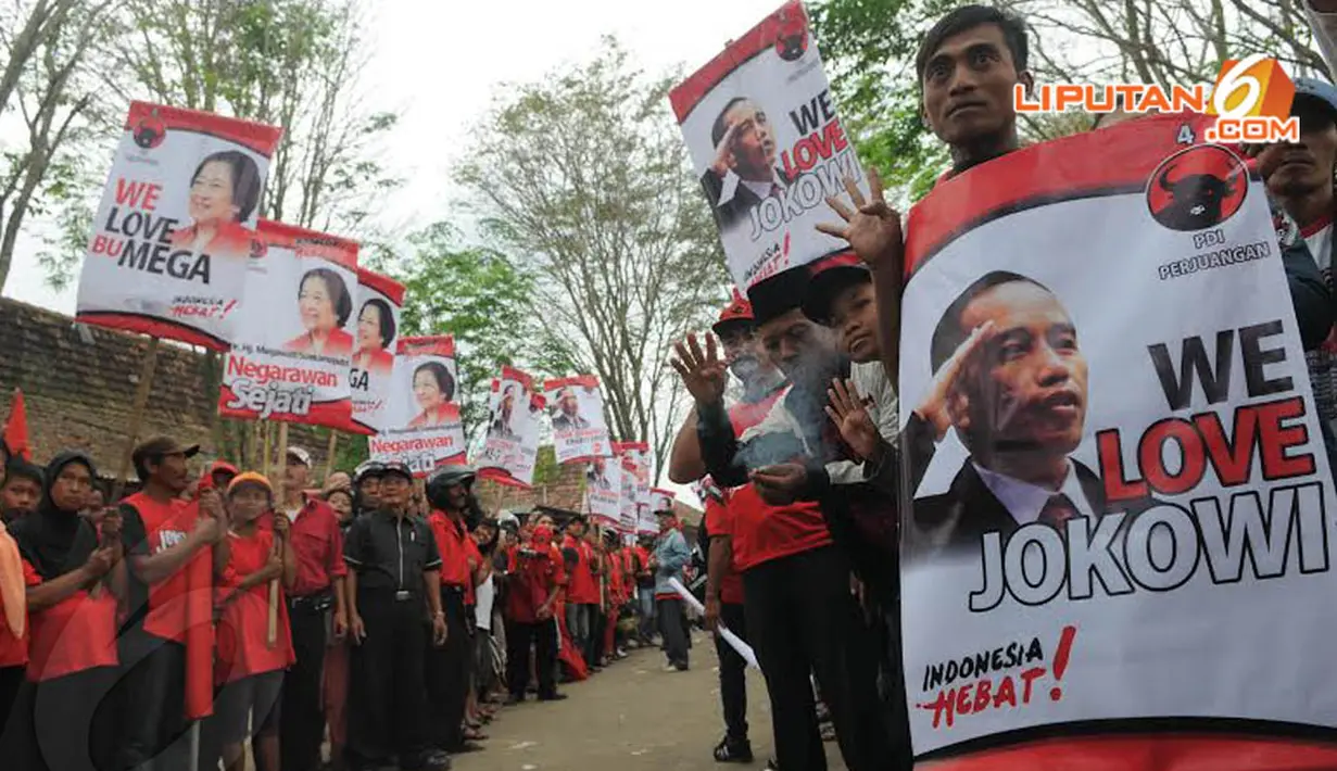  Spanduk dan poster yang menggambarkan rasa cinta pada tokoh PDIP juga disiapkan para simpatisan PDIP (Liputan6.com/Herman Zakharia)