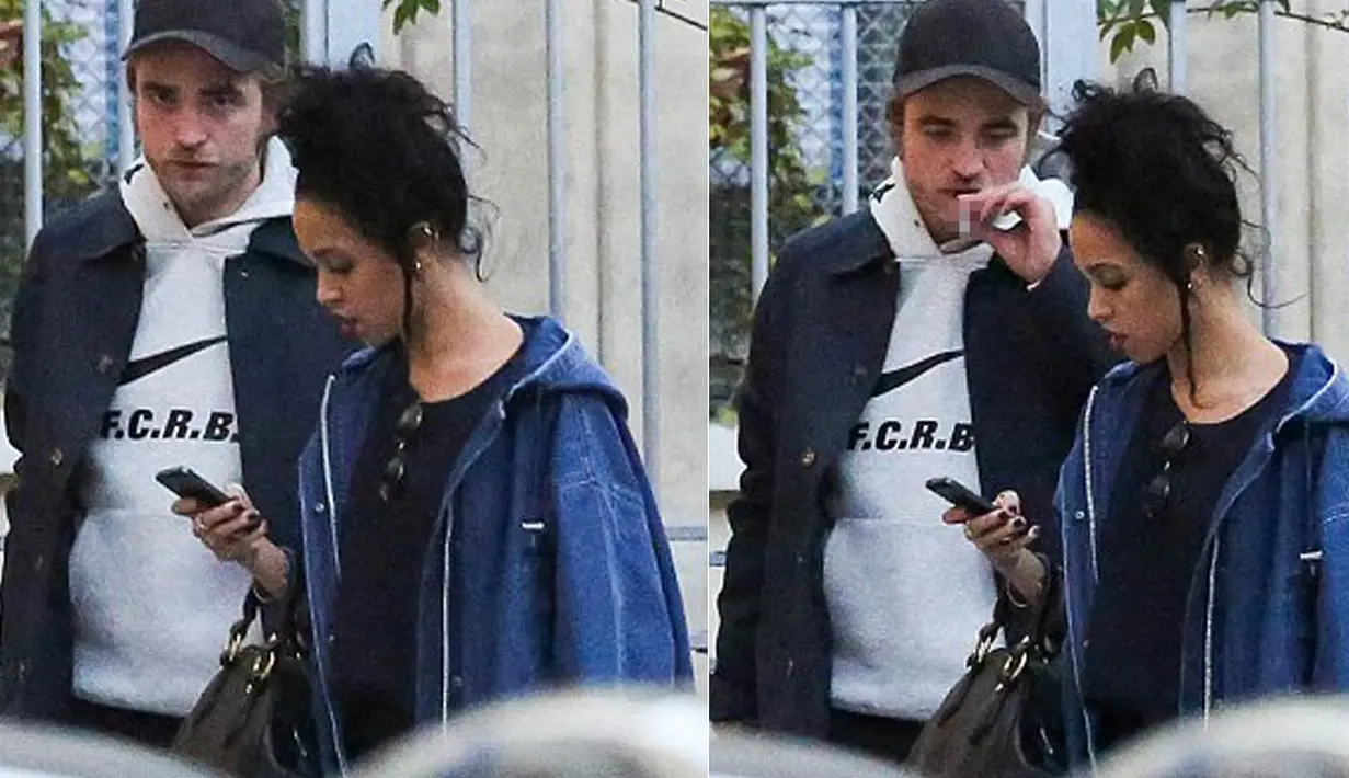 Robert dan FKA Twigs tampak bersenang-senang di kota romantis yang terkenal dengan menara Eiffel-nya itu, (15/10/14). (Dailymail)