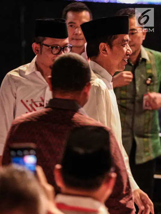 Presiden Joko Widodo tiba menghadiri konsolidasi calon legislatif Partai Kebangkitan Bangsa (PKB) Pemilu 2019 sekaligus haul Abdurrahman Wahid, Gus Dur di Balai Sarbini, Jakarta, Senin (17/12). (Liputan6.com/Faizal Fanani)