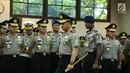 Kapolri Jenderal Tito Karnavian bersiap memimpin acara  serah terima jabatan (sertijab) Kapolda Metro Jaya di Rupatama Mabes Polri, Rabu (26/7). Inspektur Jenderal (Irjen) Idham Aziz resmi menjabat sebagai Kapolda Metro Jaya. (Liputan6.com/Faizal Fanani)