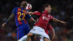 Keinginan Aleix Vidal meninggalkan Barcelona disambut baik oleh AC Milan dan Napoli yang siap menampung sang pemain apabila benar-benar ingin menyudahi kariernya bersama skuat Catalan. (AFP/Oli Scarff)
