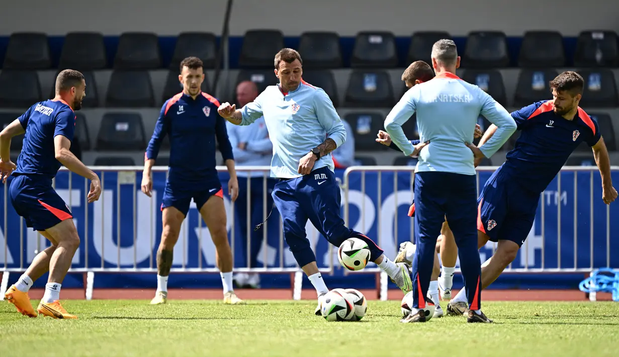 Kroasia bakal menantang Italia pada laga terakhir Grup B Euro 2024 di Red Bull Arena, Selasa (25/6/2024) dini hari WIB. (GABRIEL BOUYS / AFP)