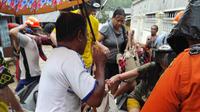 Penanganan warga terdampak bencana di Kota Manado, Jumat (27/1/2023).