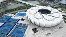 Foto udara pada 1 April 2022 ini menunjukkan Pusat Tenis Pusat Olahraga Olimpiade Hangzhou, tempat Asian Games ke-19, di Hangzhou di provinsi Zhejiang timur China. Asian Games ke-19 Hangzhou 2022 rencananya digelar pada 10-25 September 2022. (STR / AFP)