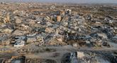 Foto udara ini menunjukkan bangunan-bangunan yang hancur di kawasan Al-Remal, Kota Gaza, pada 23 Oktober 2025. (Foto oleh AFP)