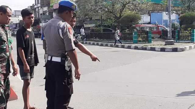 Lokasi diduga pria berseragam polisi melompat
