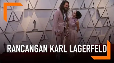 Pasangan Jason Momoa dan Lisa Bonet mengenakan pakaian yang dirancang oleh Karl Lagerfeld di Oscar 2019. Ini rancangan Karl terakhir sebelum ia meninggal pada 19 Februari 2019.