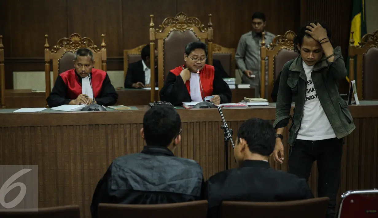 Suasana sidang di Pengadilan Negeri (PN) Jakarta Pusat, Senin (28/3). Dua pengacara dan satu mahasiswa terkait dugaan kriminalisasi yang dilakukan oleh aparat kepolisian terhadap mereka. (Liputan6.com/Faizal Fanani)