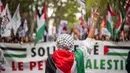 Pengunjuk rasa mengenakan bendera Palestina berunjuk rasa mendukung rakyat Palestina di Toulouse, Prancis, pada 11 September 2024. (Lionel BONAVENTURE/AFP)