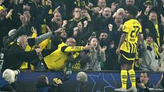 Penyerang Borussia Dortmund, Karim Adeyemi merayakan gol kedua timnya pada matchday 2 League Phase Liga Champions 2024/2025 melawan Celtic di Signal Iduna Park, Selasa 1 Oktober 2024 atau Rabu (2/10/2024) dini hari WIB. (INA FASSBENDER/AFP)