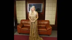 Penyanyi Lady Gaga tampil sopan di konferensi pers tur Artpop di pacuan kuda Meydan, Dubai, (8/9/14). (AFP PHOTO/ Karim Sahib)