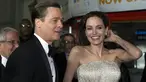 Brad Pitt (kiri) dan Angelina Jolie tiba di pemutaran perdana film " By the Sea " pada malam pembukaan AFI FEST 2015 di Hollywood, California, Kamis (5/11/2015). Film ini diproduksi dan disutradarai sendiri oleh Angelina Jolie. (REUTERS/Mario Anzuoni)