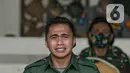 Ekspresi Aprilia Manganang setelah namanya berubah menjadi Aprilio Perkasa Manganang di Mabes AD, Jakarta, Jumat (19/3/2021). PN Tondano resmi mengabulkan permohonan pengubahan nama Aprilia Manganang menjadi Aprilio Perkasa Manganang. (Liputan6.com/Faizal Fanani)