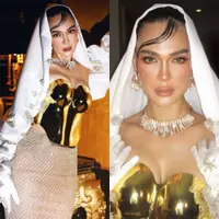 Luna Maya baru saja mengunggah beberapa potret terbaru dirinya di acara Premiere Suzzanna Malam Jumat Kliwon. Di film ini, Luna Maya memerankan karakter Suzzanna, namun di acara gala premiere, dirinya justri tampil bak pengantin, pancarkan aura goddess cantik luar biasa. Foto: Instagram.