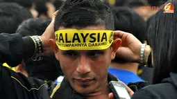 Suporter Laga Pertandingan Piala AFF Suzuki 2012 antara Malaysia vs Indonesia di Stadion Bukit Jalil, Kuala Lumpur, Malaysia, pada 1 November 2012.
