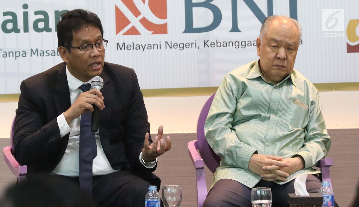 Staf Khusus Kementrian Kordinator Bidang Kemaritiman Indonesia Purbaya Yudi Sadewa memberi pemaparan saat diskusi di Jakarta, Rabu (19/7). Diskusi ini membahas kebijakan pembentukan empat super-holding BUMN lintas sektoral. (Liputan6.com/Angga Yuniar)