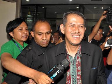 Mantan Dirjen PHU Kementerian Agama, Anggito Abimanyu, kembali diperiksa penyidik KPK, Jakarta, (7/9/14). (Liputan6.com/Miftahul Hayat)