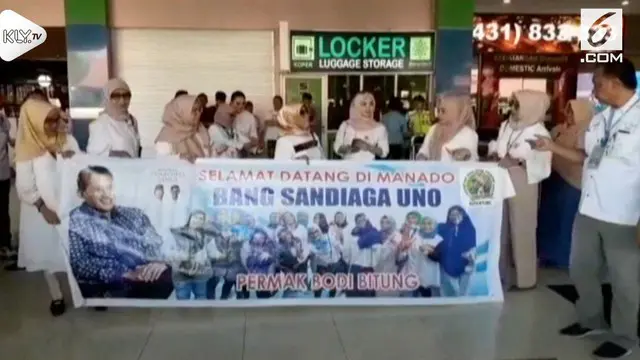 Cawapres no urut 2, Sandiaga Uno tiba di Manado Sulawesi Utara, Senin (5/11) pagi. Sejumlah emak-emak berhijab antusias menyambut di bandara Sam Ratulangi.