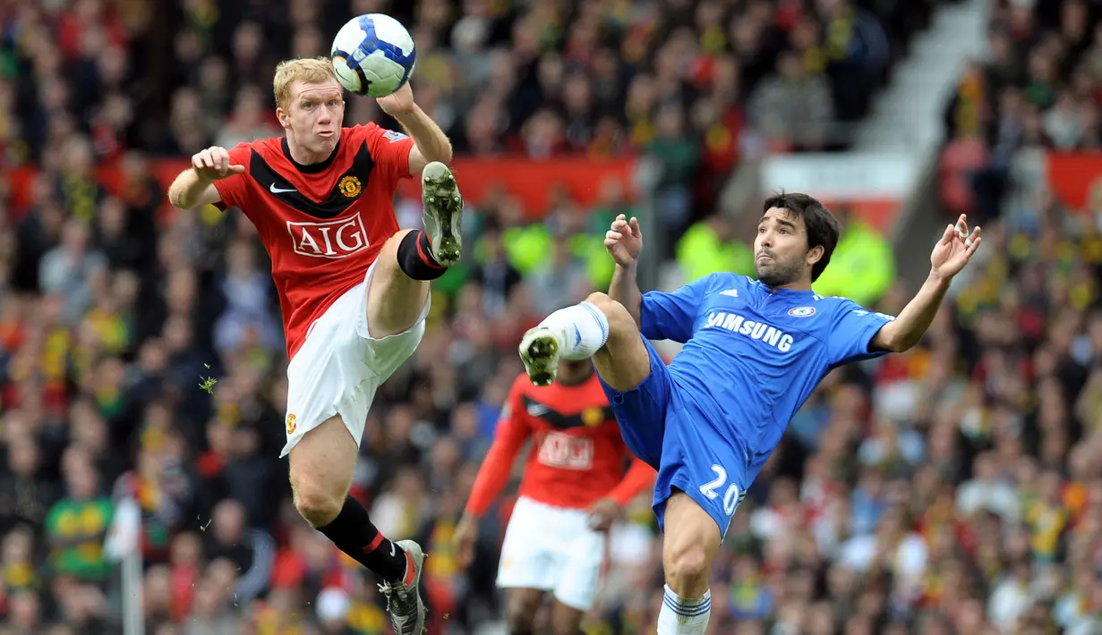 Paul Scholes merupakan salah satu pengumpan terbaik di dunia, bersanding dengan nama Xavi Alonso, dan Andreas Iniesta. Ia berhasil meraih 11 Piala Liga Inggris, 3 Piala FA, 2 Piala Liga, 2 Piala Liga Champions, dan masih banyak lainnya dari 499 pertandingannya bersama MU. (Foto: AFP/Andrew Yates)