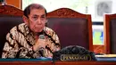 Mantan Dirjen Pajak Hadi Poernomo saat membacakan kesimpulannya dalam sidang praperadilan terhadap KPK di Pengadilan Negeri Jakarta Selatan, Senin (25/5/2015). (Liputan6.com/Yoppy Renato)