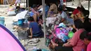 Warga berlindung di lapangan balai kota, Provinsi Sarangani, Filipina, Rabu 10 Juni 2026. (AP Photo/Basilio Sepe)