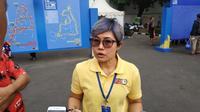 Direktur RunID, Bertha Gani, pada acara tiket.com Kudus Relay Marathon (TKRM) 2018 di Kudus, Sabtu (20/10/2018). (Bola.com/Okky Herman Dilaga)