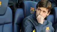 Ekspresi asisten pelatih Barcelona Tito Vilanova di laga lanjutan La Liga menghadapi Malaga di Camp Nou, 2 Mei 2012. Tito resmi jadi pelatih Barca musim 2012-2013. AFP PHOTO / LLUIS GENE