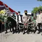 Peluncuran mobil vaksin di Tugu Pahlawan Surabaya. (Dian Kurniawan/Liputan6.com)