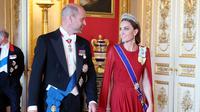 Kate Middleton dan Pangeran William menghadiri acara jamuan kenegaraan menyambut Presiden Prancis. (dok. Chris Jackson / POOL / AFP)