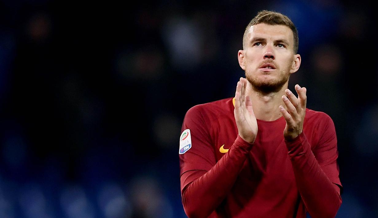 7. Edin Dzeko (AS Roma) - 13 Gol. (AFP/Marco Bertorello)