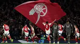 Gelandang Arsenal, Mikel Merino (tengah kanan) merayakan gol ketiga tim saat pertandingan leg pertama perempat final Liga Champions 2024/2025 melawan Real Madrid, di Stadion Emirates, London, pada 8 April 2025 atau Rabu 9 April 2025 dini hari WIB. (Adrian Dennis/AFP)