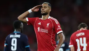 Cody Gakpo mencetak gol dalam duel pramusim Liverpool versus Athletic Club di Anfield, Selasa (5/8/2025) dini hari WIB. (Darren Staples/AFP)