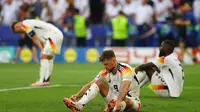 Pemain Jerman tertunduk lesu usai kalah 1-2 dari Spanyol pada perempat final Euro 2024 (AP)