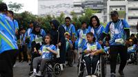 Para peserta berkebutuhan khusus di ajang Binusian Fun Run 2025. (Binusian Fun Run)