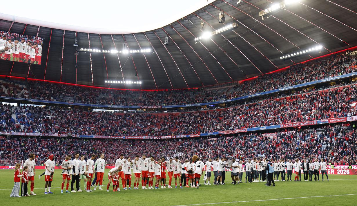 Kemenangan tersebut membuat Bayern Munchen tak terkejar hingga akhir musim dengan koleksi 79 poin atau terpaut 15 angka dari Borussia Dortmund sebagai runner up. (AFP/Alexandra Beier)
