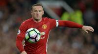 Kapten Manchester United, Wayne Rooney. (AFP/Oli Scarff)