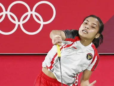 Wakil Indonesia, Gregoria Mariska Tunjung, berhasil memastikan satu tempat di babak perempat final bulutangkis nomor tunggal putri Olimpiade Tokyo 2020, Rabu (28/7/2021). (Foto: AFP/Alexander Nemenov)