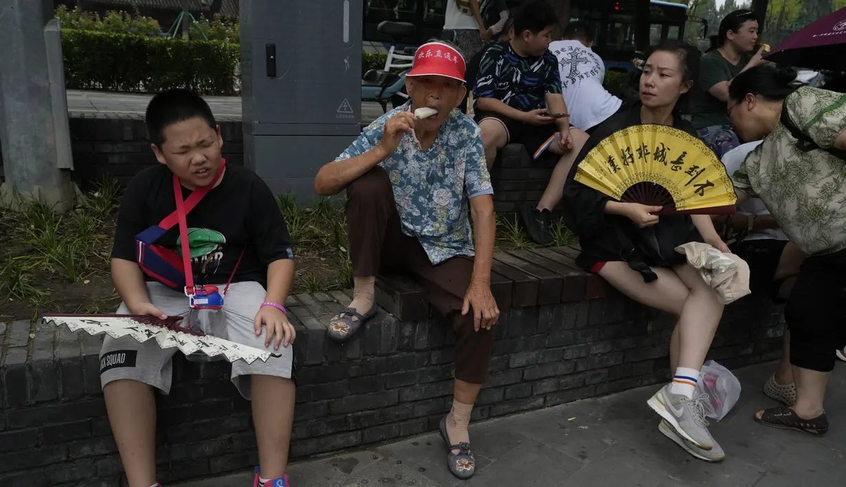 Agustus menjadi musim panas paling brutal dan mematikan dalam sejarah yang diumumkan oleh Organisasi Meteorologi Dunia WMO. (AP Photo/Ng Han Guan, File)