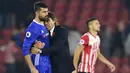 Diego Costa (Chelsea) – Pria berdarah Brasil ini akhirnya memustuskan meninggalkan Stamford Bridge. Ketidakharmonisan dengan sang pelatih menyebabkan sang pemain terdepak dari skuat utama Chelsea besutan Antonio Conte. (AFP/Glyn Kirk)