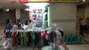 Suasana Blok B Pasar Tanah Abang usai Libur Lebaran, Jakarta, Jumat (15/7). Pengunjung pasar masih sedikit dan sejumlah toko terlihat masih tutup. (Liputan6.com/Angga Yuniar)