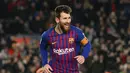 Selebrasi gol Lionel Messi usai mencetak gol ketiga Barcelona pada menit ke-91 pada laga lanjutan La Liga yang berlangsung di stadion Camp Nou, Minggu (20/1). Barcelona menang 3-1 atas Leganes. (AFP/Josep Lago)