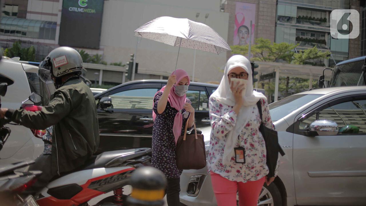 Potret Warga Jakarta Saat Dilanda Suhu Panas